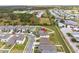 Overhead view shows home nestled in community close to local bus depot, ponds and winding roads at 1773 Yellow Trl, Lakeland, FL 33801