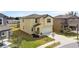 Two-story home showcasing a two car garage, green lawn and landscaped yard at 1773 Yellow Trl, Lakeland, FL 33801