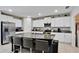 This is a bright kitchen with white cabinets, stainless steel appliances and granite countertops at 1773 Yellow Trl, Lakeland, FL 33801