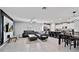 Spacious open-concept living room, kitchen, dining area with tile floors at 1773 Yellow Trl, Lakeland, FL 33801
