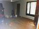 Bedroom with hardwood floors, gray walls, and a window at 1122 E Edgewood Dr, Lakeland, FL 33803