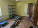 Bedroom with hardwood floors, yellow walls, and a window at 1122 E Edgewood Dr, Lakeland, FL 33803
