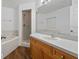 This bathroom has a combination tub and shower, shower and single sink vanity at 25 Inconnu Dr, Kissimmee, FL 34759