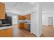 Well-designed kitchen featuring wood cabinets, stainless steel appliances, and ample counter space at 25 Inconnu Dr, Kissimmee, FL 34759