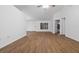Bright and airy living area features wood-look vinyl flooring and ample natural light at 25 Inconnu Dr, Kissimmee, FL 34759