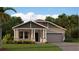 Charming single-Gathering home features stone accents, two-car garage, inviting front porch, and well-maintained landscaping at 4117 Jespersen St, Apopka, FL 32712