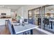 Dining area showcasing a dining table with seating for six and elegant decor at 510 Puma Loop, Groveland, FL 34736