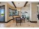 Elegant dining area featuring a cozy fireplace, stylish chandelier, and scenic views, perfect for intimate meals at 7769 Summerlake Pointe Blvd, Winter Garden, FL 34787