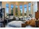 Home office with great natural light features built-in desks and a comfortable seating area to unwind at 7769 Summerlake Pointe Blvd, Winter Garden, FL 34787