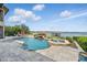Outdoor pool and jacuzzi offer a relaxing oasis with a lake view at 7769 Summerlake Pointe Blvd, Winter Garden, FL 34787
