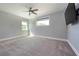 Light and airy bedroom with two windows, carpet flooring, and neutral walls, a relaxing retreat at 108 Stanton Estates Cir, Winter Garden, FL 34787