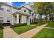 Charming two-story townhouse with a well-maintained lawn and inviting entryway at 130 Southern Pecan Cir # 205, Winter Garden, FL 34787