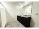 Bathroom featuring a large vanity with granite countertops and a large mirror at 1823 Pristine Loop, Lakeland, FL 33811