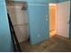 Bedroom featuring closet, closet organizer, door, and light blue walls at 894 Superior St, Deltona, FL 32725