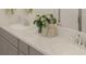 Elegant bathroom features double sinks, quartz countertops, and modern fixtures at 2828 Haze Rd, Clermont, FL 34714