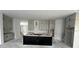 Spacious kitchen with ample cabinet space, featuring modern design and functionality at 3611 Chelsea St, Orlando, FL 32803