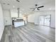 Bright open-concept living space with sliding glass doors to the lanai at 1390 Patricia St, Kissimmee, FL 34744