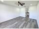 Spacious main bedroom with walk-in closet and adjacent bathroom featuring marble counters at 1390 Patricia St, Kissimmee, FL 34744