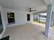 Covered outdoor patio with ceiling fan and views of the backyard at 1390 Patricia St, Kissimmee, FL 34744