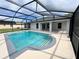 Screened-in swimming pool in the backyard with an outdoor patio at 1390 Patricia St, Kissimmee, FL 34744