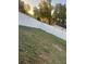 Fenced backyard offering privacy and ample space for outdoor activities at 250 Ashley Rd, Mascotte, FL 34753