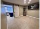 Charming dining room with tiled floors, storage cabinet, and a barn door leading to the kitchen at 105 Ingram Cir, Longwood, FL 32779