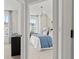 Stylishly decorated bedroom featuring contemporary decor and furniture with a beautiful view from a window at 15113 Grove Lake Dr, Winter Garden, FL 34787