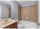 Bathroom featuring a vanity and a tub-shower combo at 3189 Kearns Rd, Mulberry, FL 33860