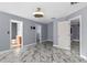 Bedroom featuring marble-look tile floor and modern ceiling fan at 3189 Kearns Rd, Mulberry, FL 33860