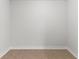 Walk-in closet with tile flooring, white trim, and neutral-painted walls at 3189 Kearns Rd, Mulberry, FL 33860
