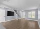 Bright living room with stairs and tile flooring at 3189 Kearns Rd, Mulberry, FL 33860