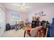 Bedroom featuring musical theme, ceiling fan, closet and natural light at 119 Lake Mariam Way, Winter Haven, FL 33884