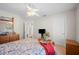 Comfortable bedroom offering a calming space with natural light and closet at 119 Lake Mariam Way, Winter Haven, FL 33884