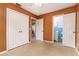 Bedroom features tile flooring and closet at 824 Interlake Dr, Lakeland, FL 33801