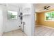 Utility room with shelving and washer/dryer hookups at 824 Interlake Dr, Lakeland, FL 33801