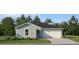 Charming one-story home featuring a well-maintained lawn and two-car garage at 1178 Hour Glass Rd, Lakeland, FL 33801