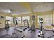 Well-equipped gym with various machines and weights, ideal for maintaining an active lifestyle at 5012 Laguna Bay Cir # 72, Kissimmee, FL 34746