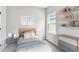 Charming bedroom with ample storage and a bright window, ideal for a  at 6057 Sacred Oak Ave, Mount Dora, FL 32757