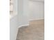 Bright living space showcasing neutral wall paint, base trim, and tile flooring at 6057 Sacred Oak Ave, Mount Dora, FL 32757