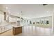 Spacious open-concept kitchen with modern appliances, a large island, and bright natural light at 6221 Trailblaze Bnd, St Cloud, FL 34771