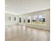 Sun-filled living room featuring recessed lighting, and several windows overlooking the backyard at 6221 Trailblaze Bnd, St Cloud, FL 34771
