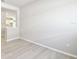 Open room with view to kitchen at 6221 Trailblaze Bnd, St Cloud, FL 34771