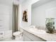 Clean bathroom with shower, tub, and countertop with sink at 7396 Capstone Dr, Groveland, FL 34736
