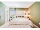Serene bedroom with neutral tones, soft lighting, and comfortable queen bed at 7396 Capstone Dr, Groveland, FL 34736