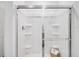 Modern walk-in shower with sleek glass doors and built-in shelves at 7396 Capstone Dr, Groveland, FL 34736