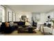 Spacious living room features stylish furniture, modern decor, and an open floor plan at 958 Hour Glass Rd, Lakeland, FL 33801