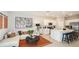 Open-concept living room and kitchen area with an island and modern decor at 2541 Penguin Blvd, Davenport, FL 33837