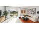 Contemporary living room with a large window, stylish furniture, and chic decor at 2541 Penguin Blvd, Davenport, FL 33837