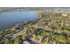 An aerial view reveals the lakefront community, perfect for nature lovers at 1841 5Th Se St, Winter Haven, FL 33880