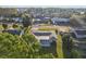 An aerial view displays a home with a spacious yard in a quiet neighborhood setting at 1841 5Th Se St, Winter Haven, FL 33880